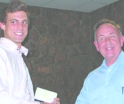 Luke (on left) receiving the second half of his SAIMC scholarship from John Owen-Ellis